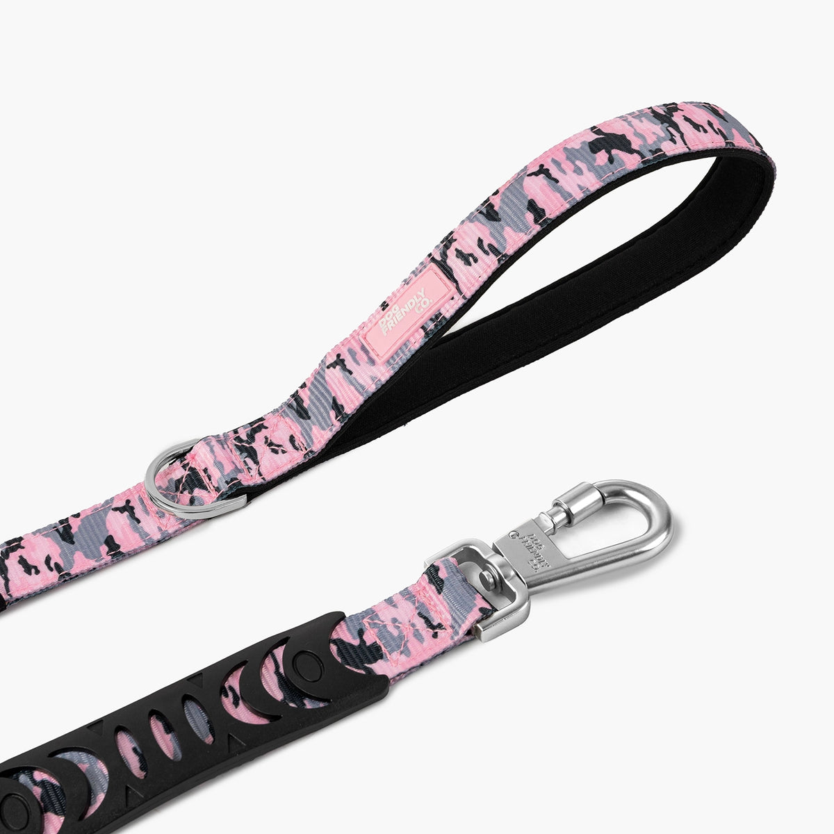 Close-up of the Pink Camo bungee dog leash showing the padded handle, bungee section and heavy-duty clip.