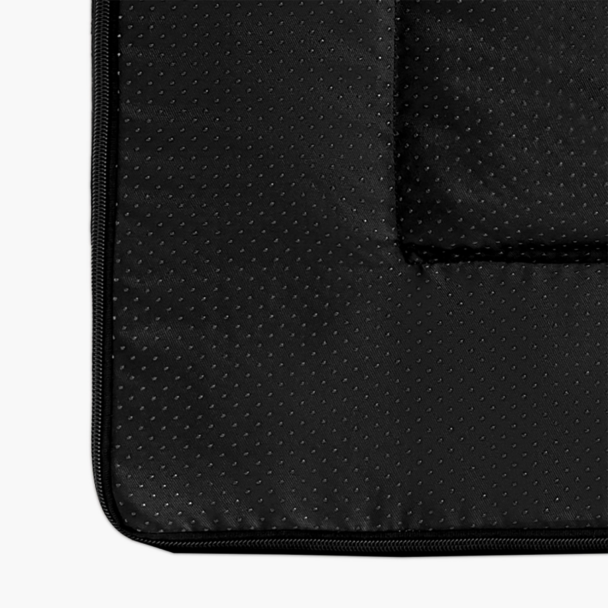 Close-up of the black textured interior lining and zipper of the grey bouclé replacement cover.