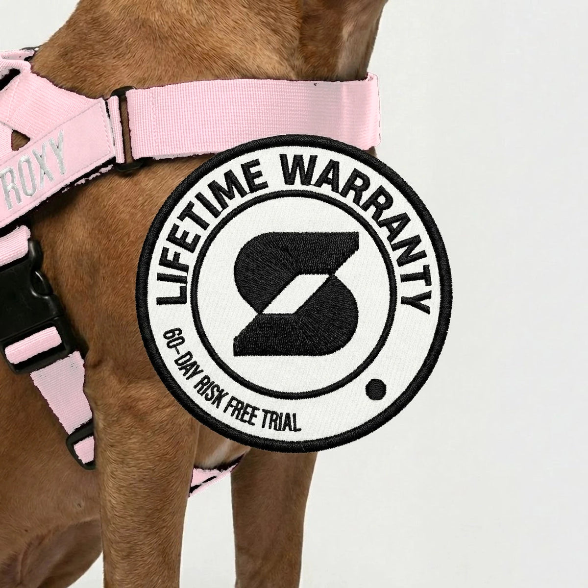 Lifetime Warranty, 60-day risk free trial badge over a dog wearing the Sakura harness